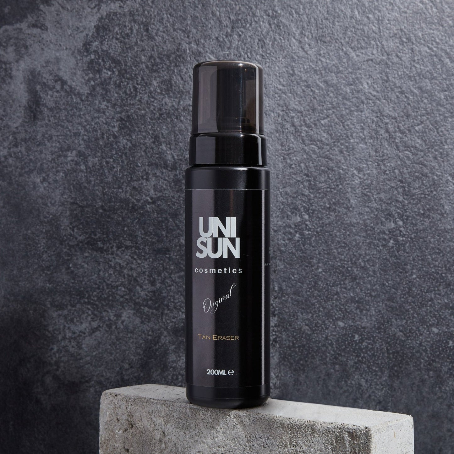 Bottle of self-tanning mousse, perfect for a natural, streak-free tan